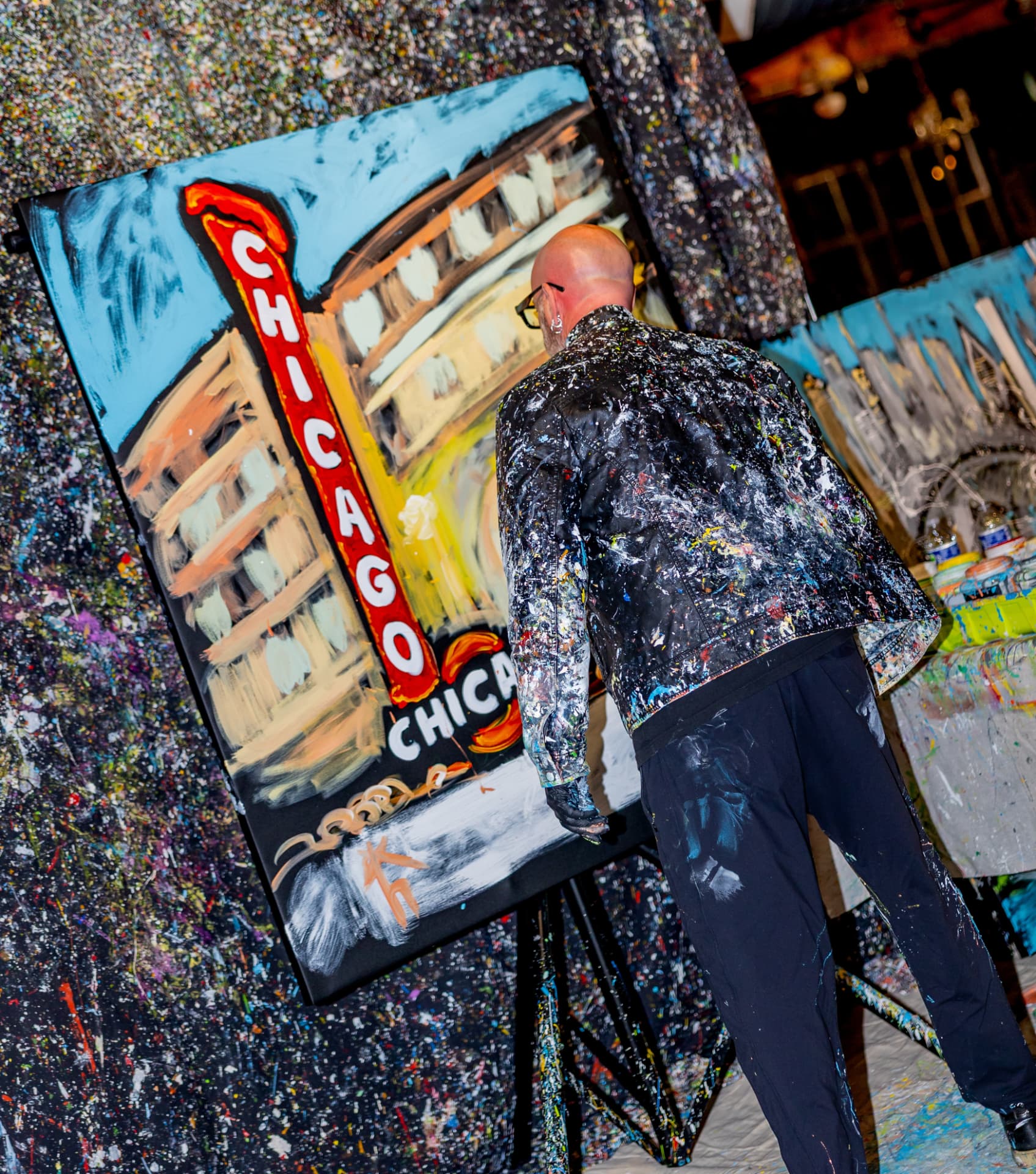 Elliott From painting a Chicago Theatre canvas live on stage